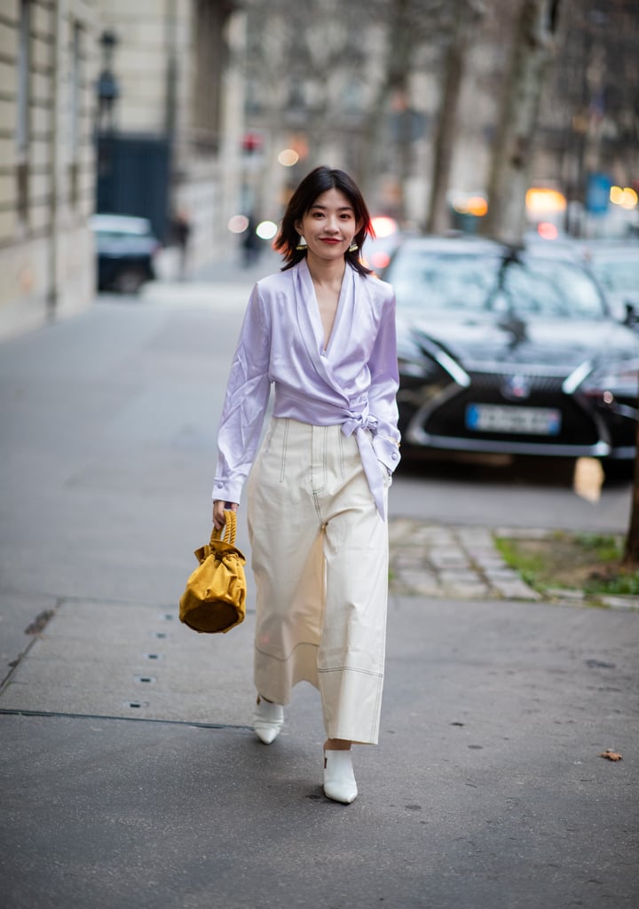 Experiment with texture: a colourful silk top is unexpected with cropped cotton pants.