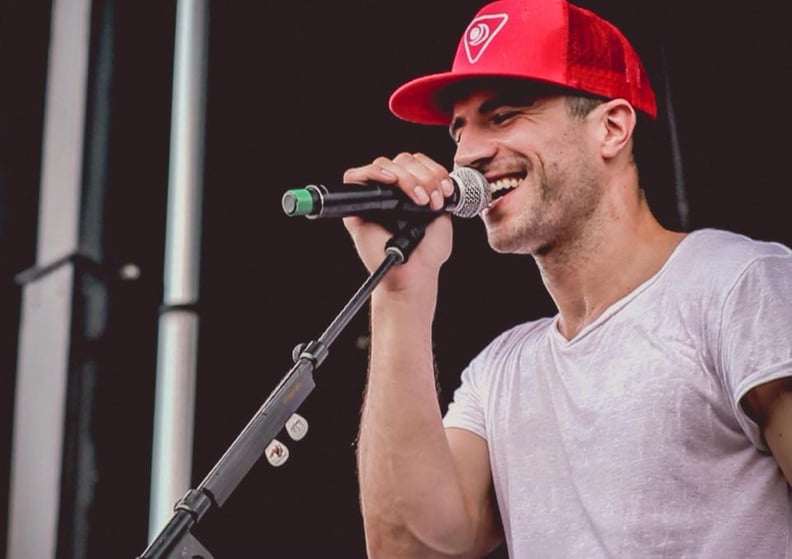 Observe that he looks quite good in a baseball hat.