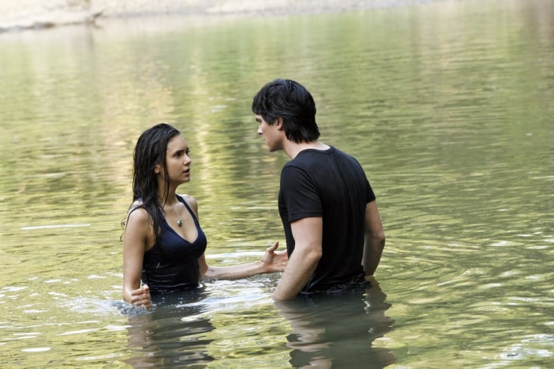 The water isn't the only thing that's deep here — just look at that intense conversation between Elena and Damon.