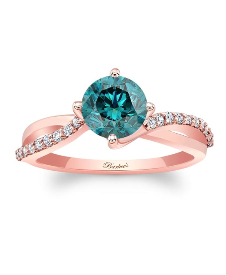 独特的玫瑰金扭曲的蓝钻石订婚戒指
