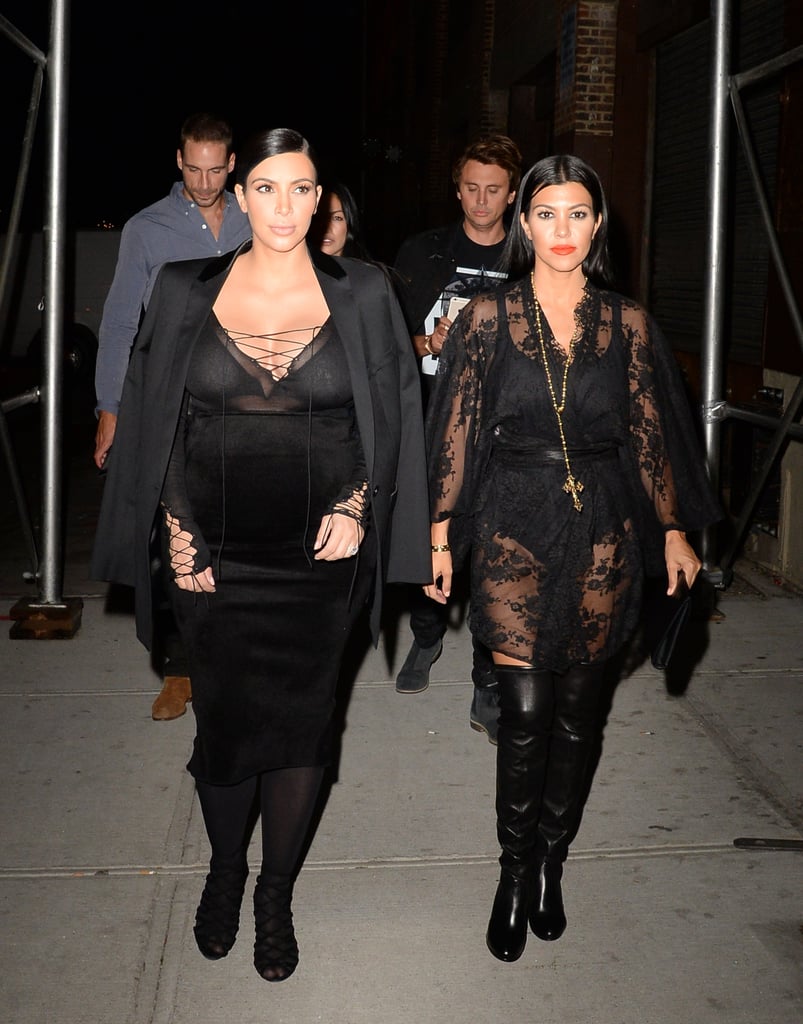 Kim wasn’t the only one showing a flash of skin! Kourtney and Kim abided by the same dress code for their night on the town — Kourtney in Kris Jenner's see-through lace robe and leather over-the-knee boots.
