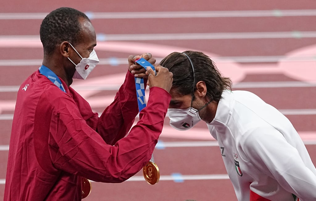 Olympic High Jumpers Share the Gold Medal | Photos