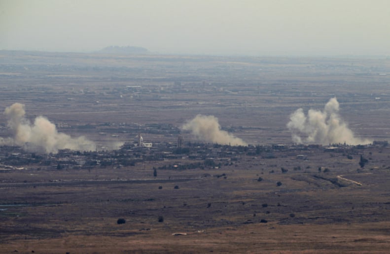 Smoke rises after an airstrike in the Syrian village of Jubata al-Khashab, which neighbors Israel.