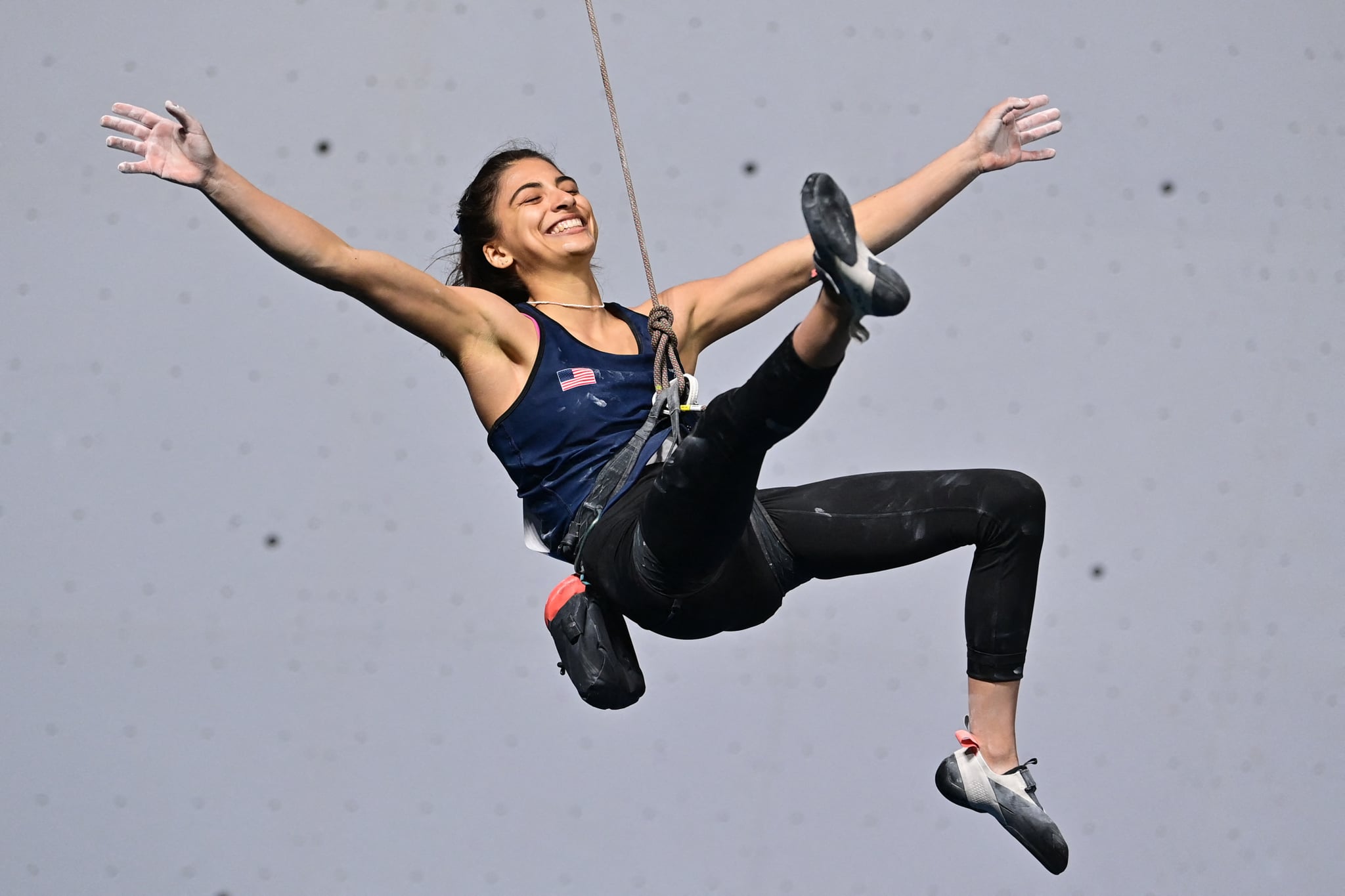 TOPSHOT - USA's Natalia Grossman celebrates after competing in the lead stage during the sport climbing women's boulder & lead final of the Pan American Games Santiago 2023, at the Cerrillos Park Climbing Walls in Santiago on October 24, 2023. (Photo by Pablo VERA / AFP) (Photo by PABLO VERA/AFP via Getty Images)