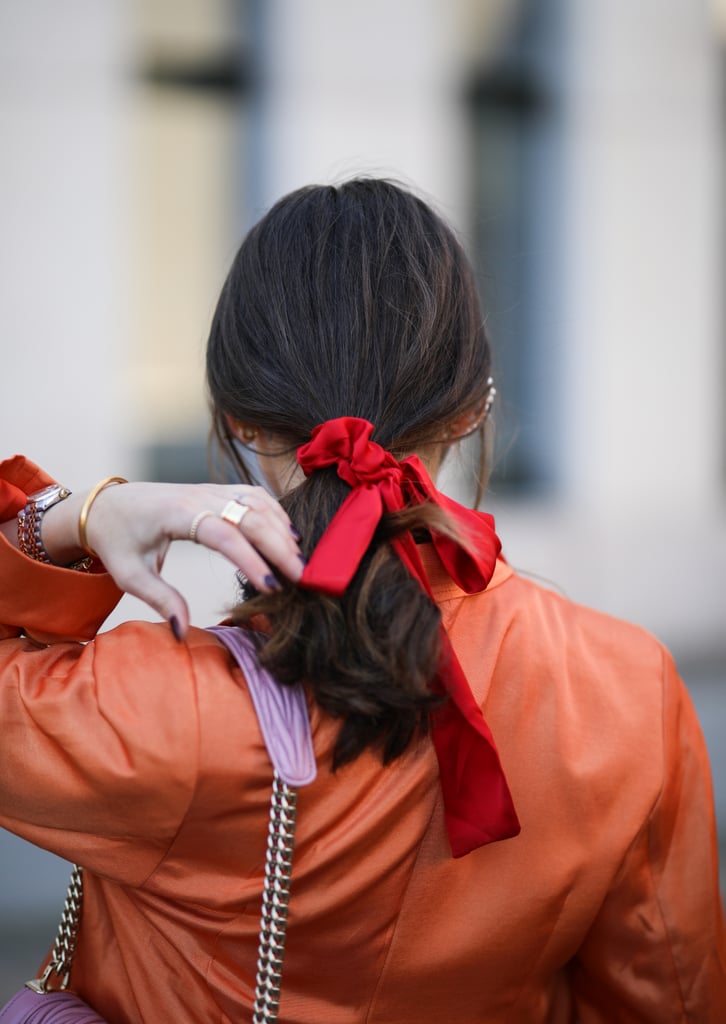 No idea how to braid? Consider your other options: "When hair is in a secure ponytail, it's easy to spice up the style by adding a couple of well-placed, bedazzled snap clips, bobby pins, or barrettes. You can even add a statement scrunchy at the base of the tail."
