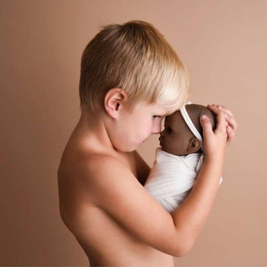 Photo Shoot of a Boy With His Doll