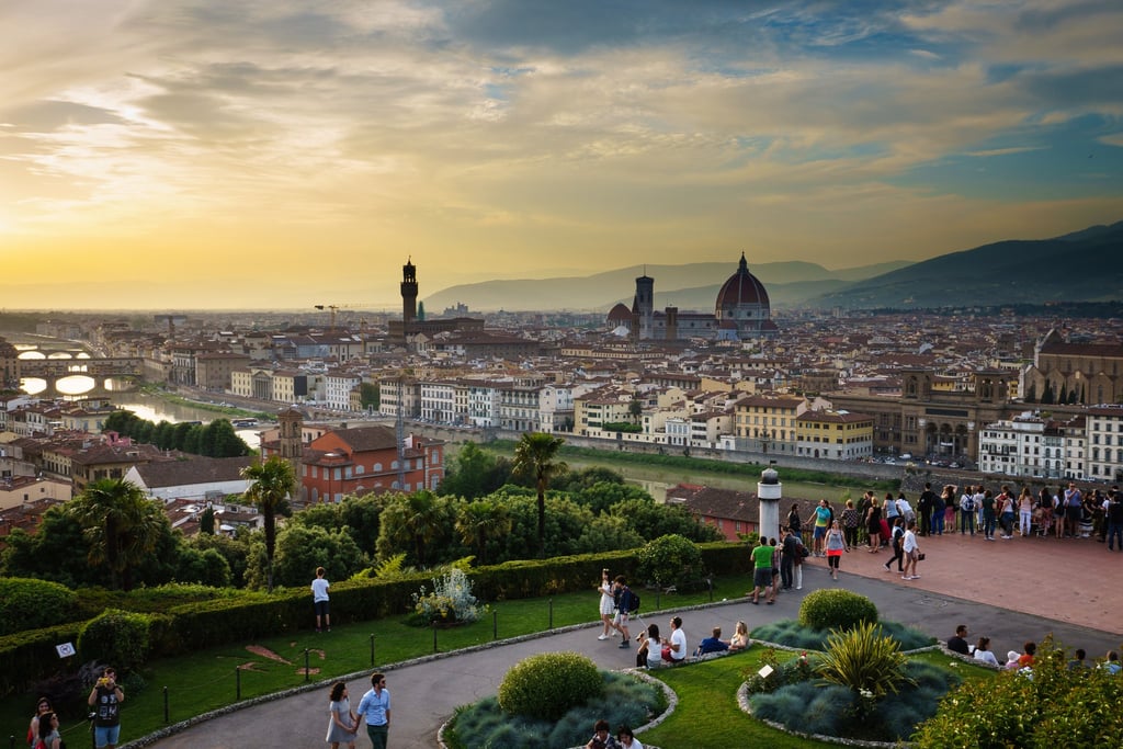 Dinner with a view
While Florence is a great place for a steak dinner, it's even better for bread and dazzling views. Pick up a bottle of wine and your second panino of the day from Pino's or heart-shaped pizza from Gustapizza and hike up to Piazzale Michelangelo. Sit on the steps as you watch the sun setting over the Duomo, a simple but unforgettable way to end your day in the city.