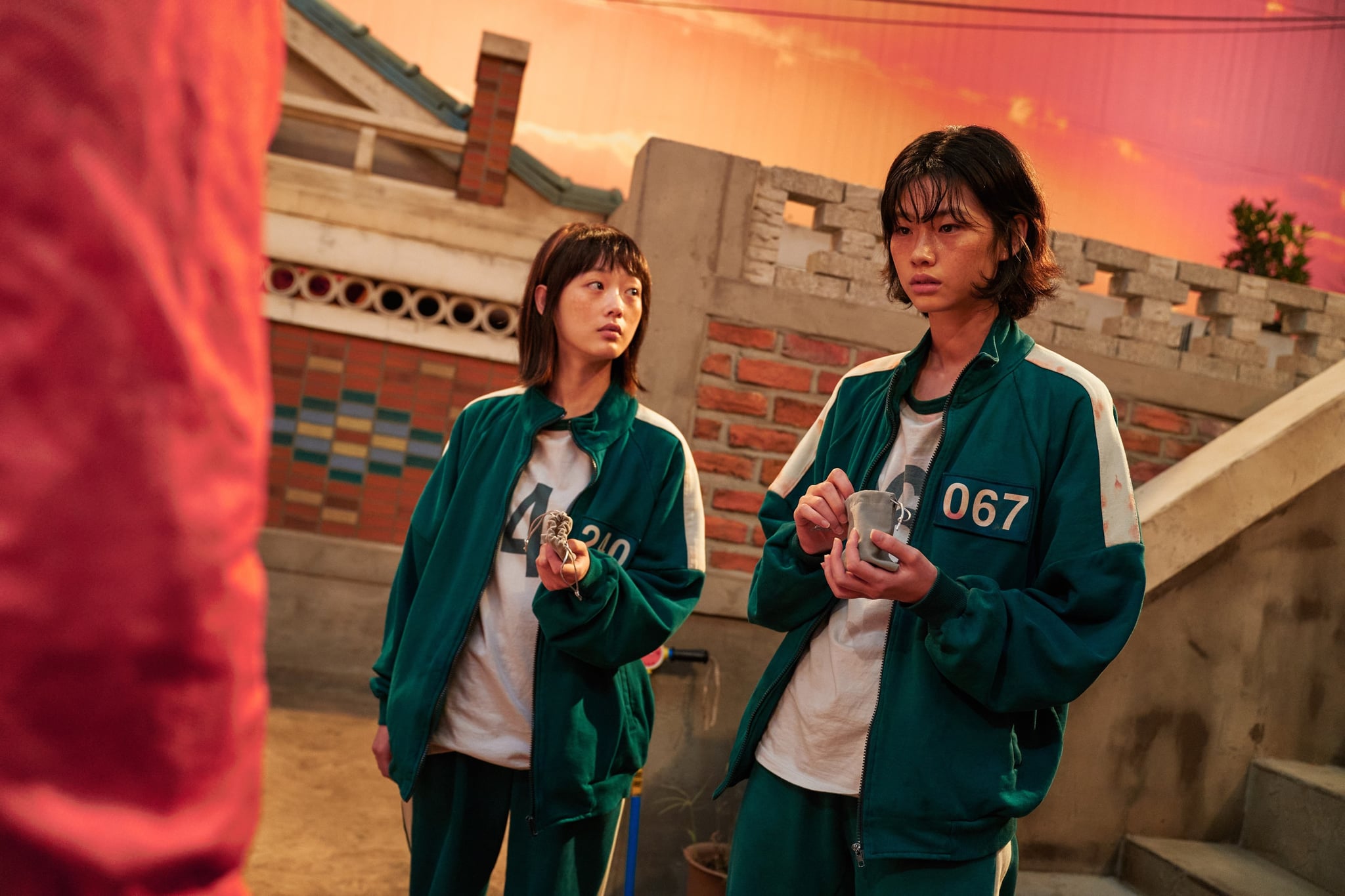 SQUID GAME, from left: LEE yoo-mi, JUNG Ho-yeon, Gganbu', (Season 1, ep. 106, aired in the US on Sept. 17, 2021). photo: Noh Juhan / Netflix / Courtesy Everett Collection