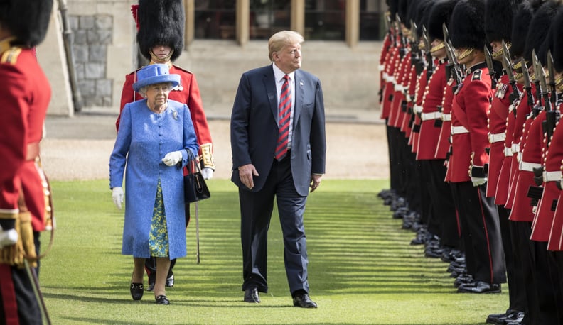 WINDSOR, ENGLAND - JULY 13:  U.S. President Donald Trump and Britain's Queen Elizabeth II inspect a Guard of Honour, formed of the Coldstream Guards at Windsor Castle on July 13, 2018 in Windsor, England.  Her Majesty welcomed the President and Mrs Trump 