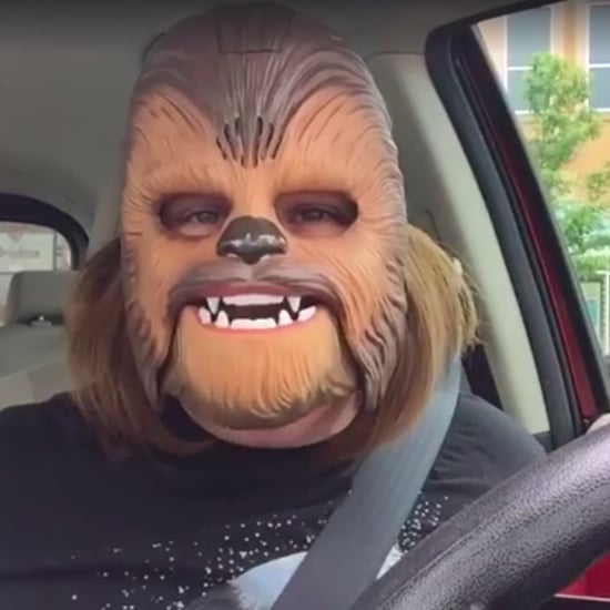 Woman Trying On Chewbacca Mask Video