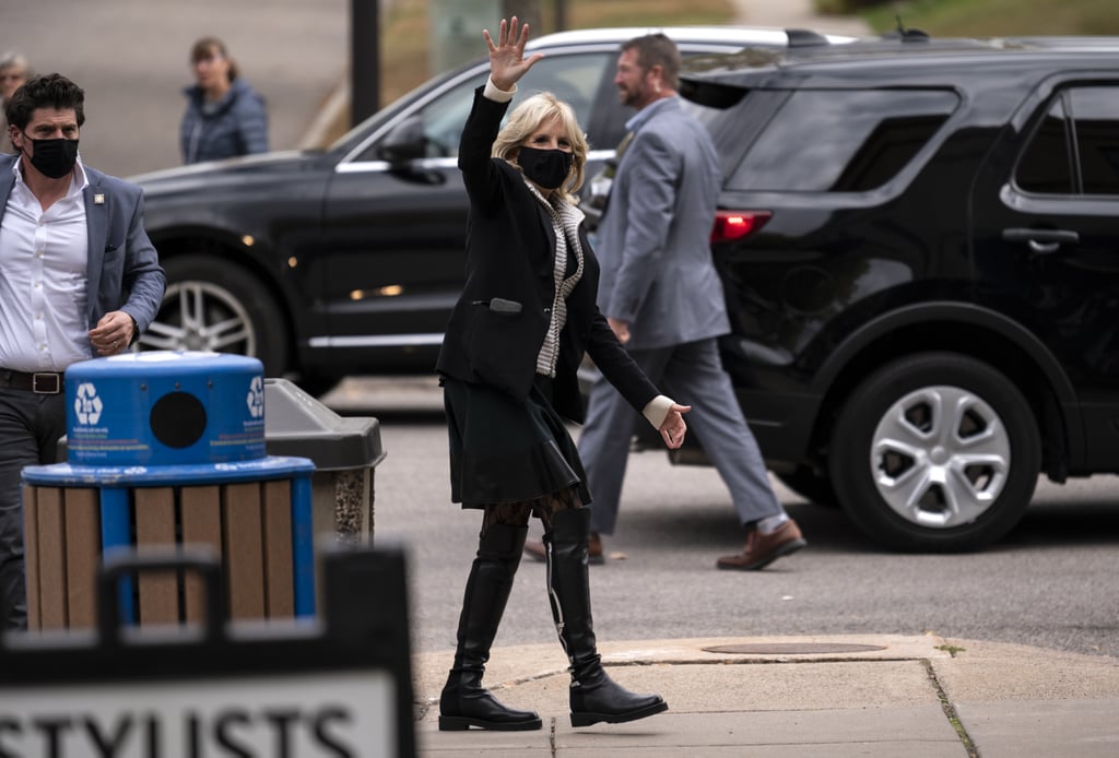 Jill wore her Vote boots throughout the campaign trail. She coordinated them with lace tights and a knee-length skirt while in St. Paul, MN, in early October 2020.