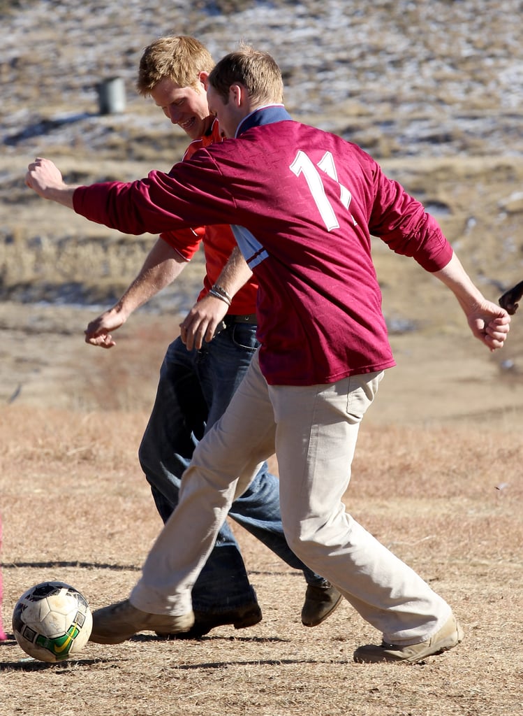 The brothers played soccer with a group of kids in Lesotho in June 2010.