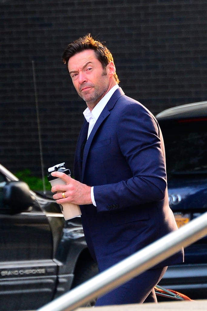 Hugh Jackman Walking His Dogs in a Suit in NYC