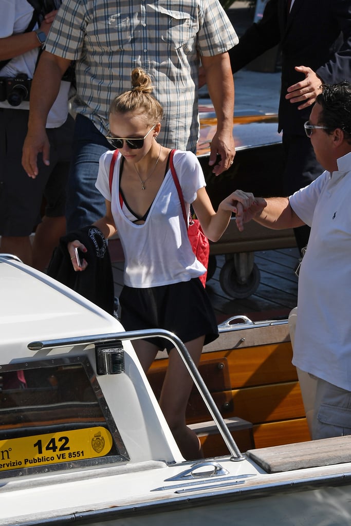 She's Styled This Red Back-Bag With a Handful of Outfits