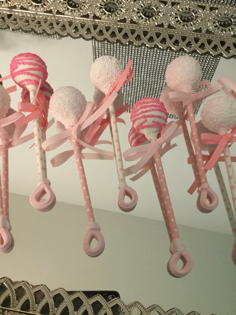 Pink and White Drizzled and Sprinkled Baby Rattle Cake Pops