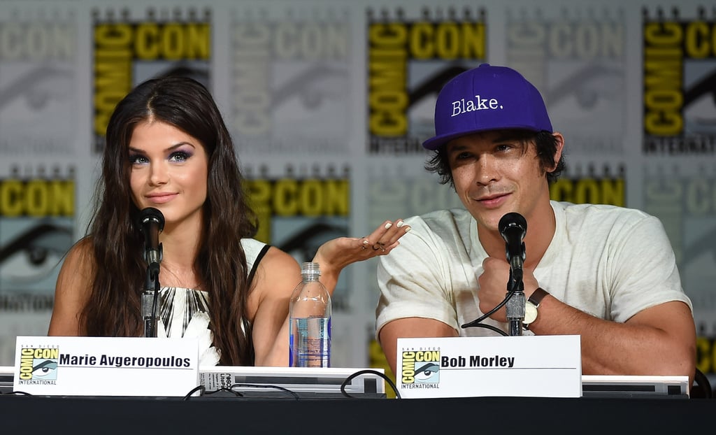Pictured: Marie Avgeropoulos and Bob Morley.