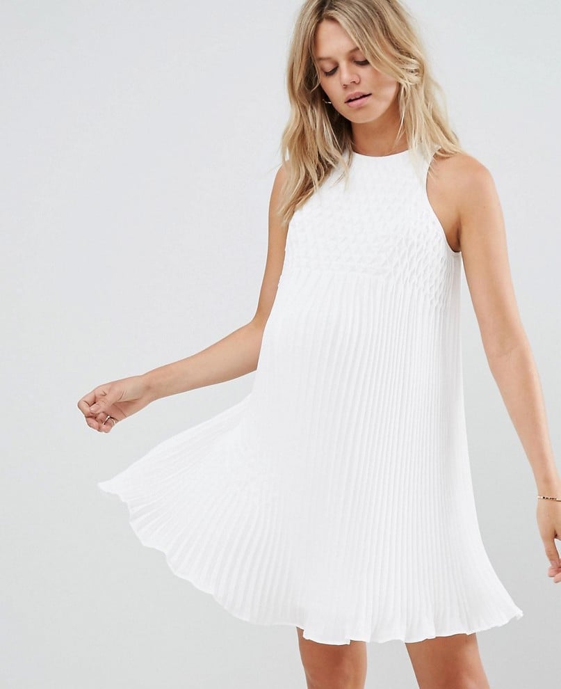 Pregnant life in the ASOS Maternity Swing Dress With Honeycomb Yoke ($87) is about to make things so, so pretty.