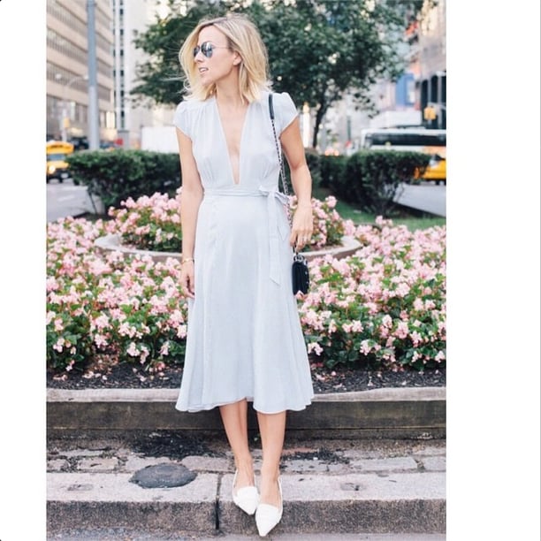 A deep V-neck dress looks casual yet clean completed with a pair of white pointed flats, whereas heels might overdo it.
Source: Instagram user damselindior