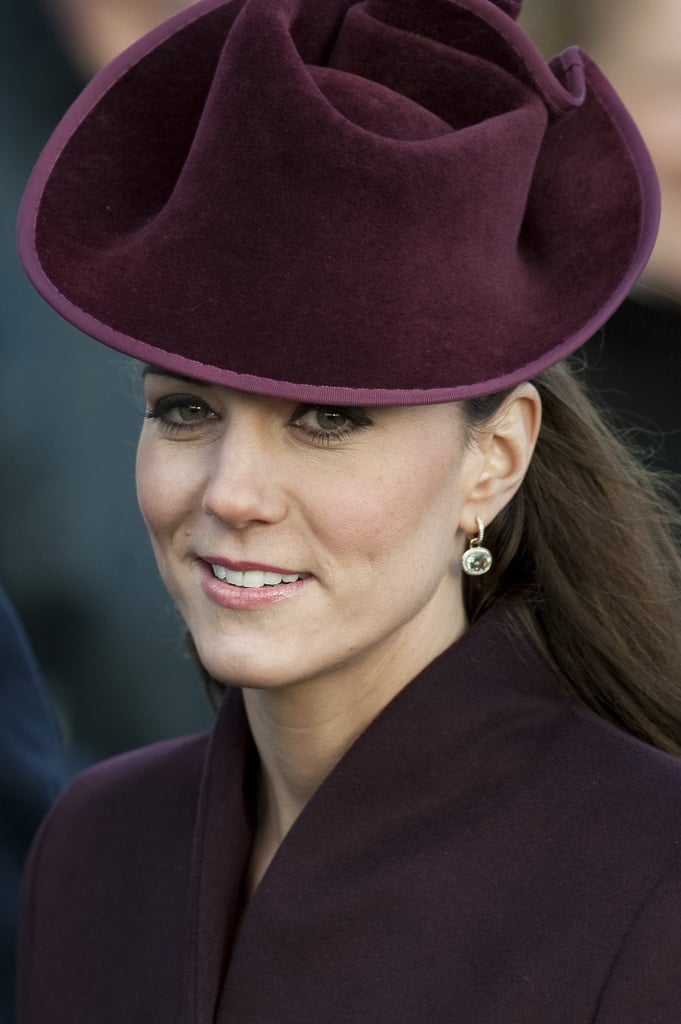 The first time Kate wore her green amethyst and diamond earrings by her favorite designer, Kiki McDonough, was on Christmas Day 2011. It seems as though they were her Christmas present from William marking their first festive season as a married couple.