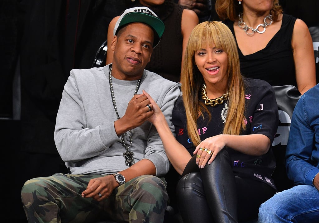 Beyoncé and Jay Z took in a Brooklyn Nets game in NYC in November 2012 and cutely celebrated when the team scored.
