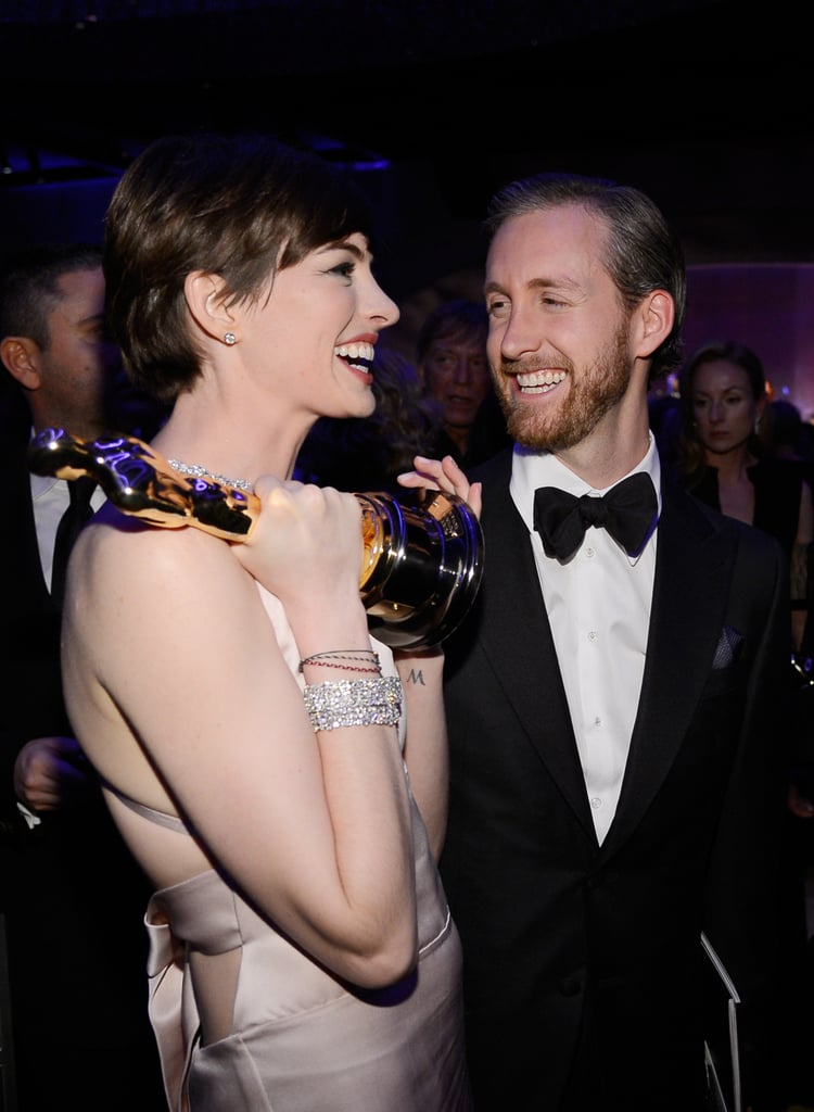 Anne Hathaway and her husband, Adam Shulman, had a laugh at the Governors Ball.