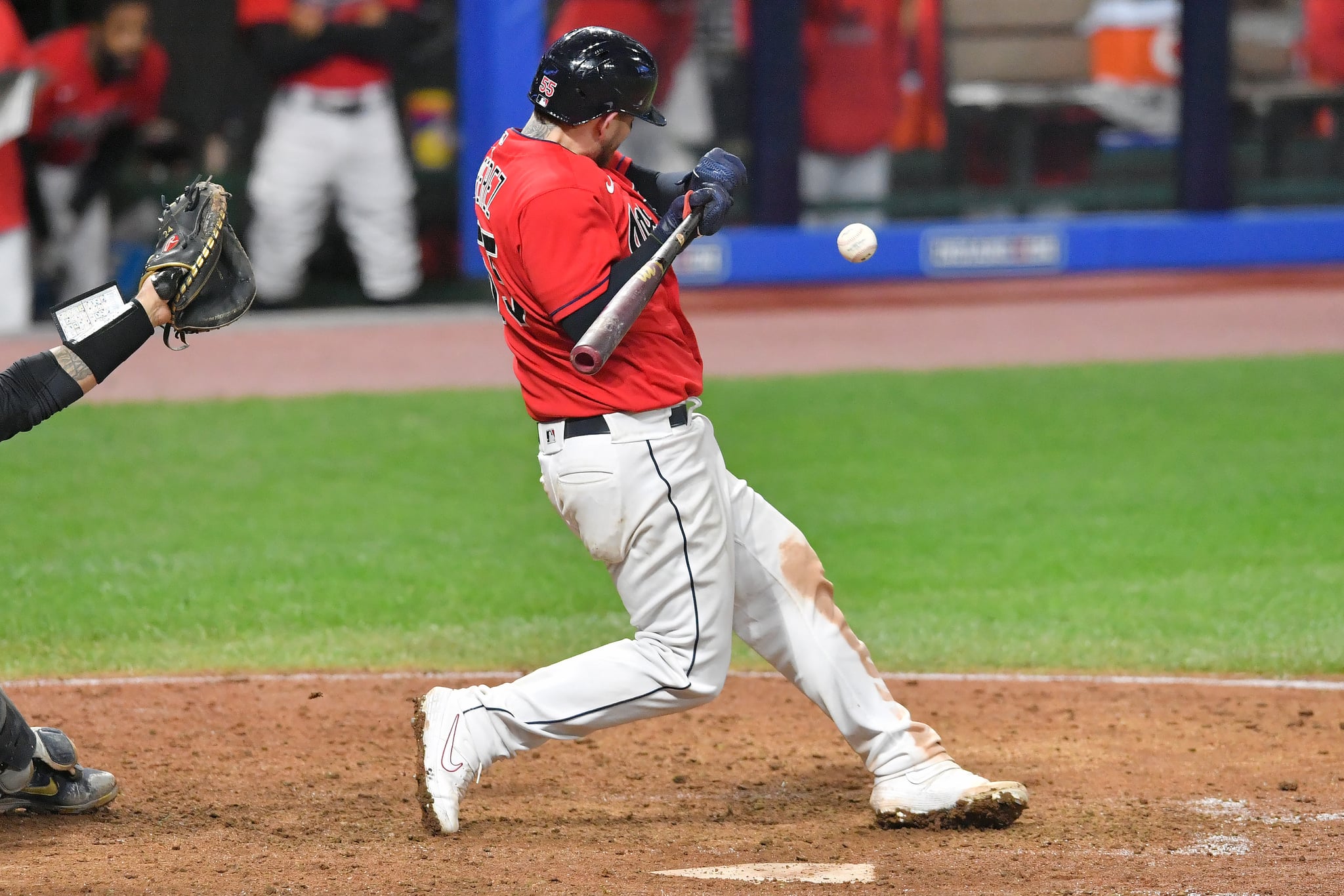 CLEVELAND, OHIO - SEPTEMBER 30: Catcher Roberto Perez #55 of the Cleveland Indians is hit by a pitch during the seventh inning of Game Two of the American League Wild Card Series against the New York Yankees at Progressive Field on September 30, 2020 in Cleveland, Ohio. The Yankees defeated the Indians 10-9.  (Photo by Jason Miller/Getty Images)