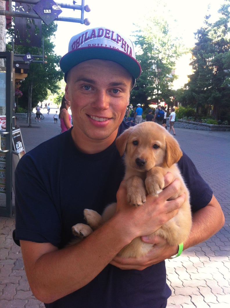 He regularly poses with dogs, and it's cute every time.