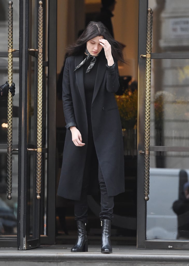 Lending a longline blazer coat all the more pizzazz with the addition of a bandana scarf.