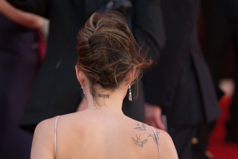 Dakota Johnson's "Amor" Nape Tattoo