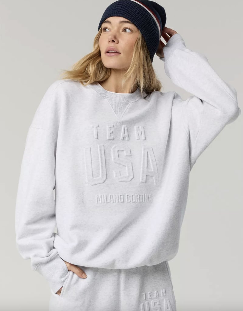 OFFLINE By Aerie Team USA Collection Cloud Fleece Crewneck Sweatshirt ($42, originally $60)
If comfort is your gold medal, this cloud fleece crewneck delivers. The ultra-soft fabric and slightly oversized fit make it perfect for cozying up during late-night event coverage. Chances of reaching for it after the closing ceremony? Very high.