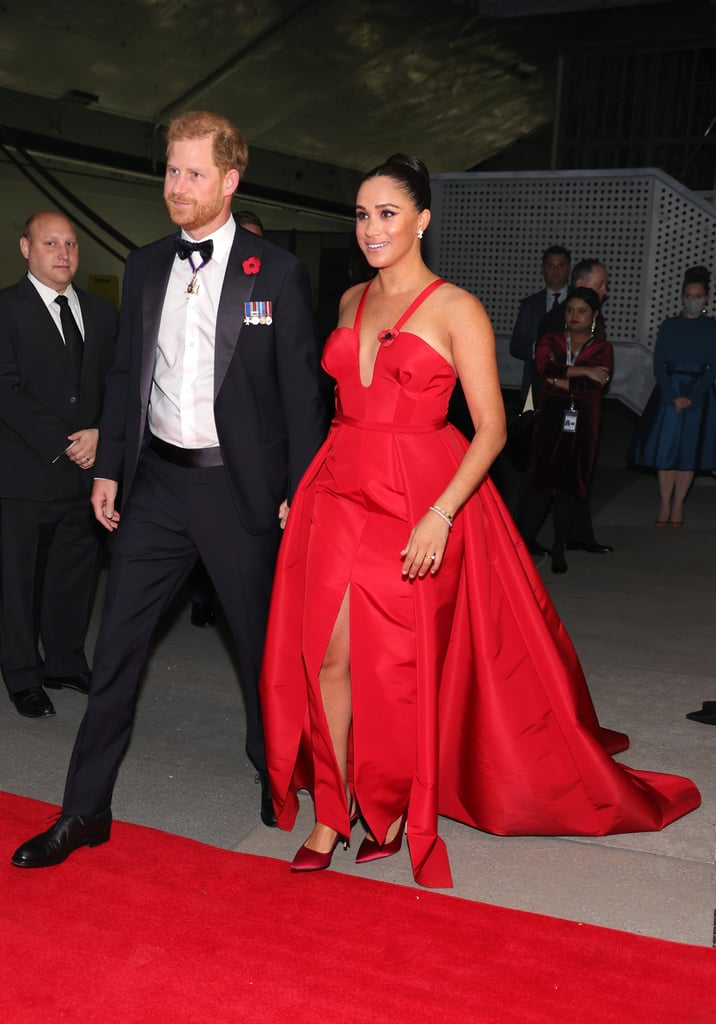 All eyes were on Markle at the 2021 Freedom Gala in a vibrant red gown custom made by Wes Gordon. The look featured a floor-sweeping train, thigh-high split, and plunging neckline, with Giuseppe Zanotti heels to match.