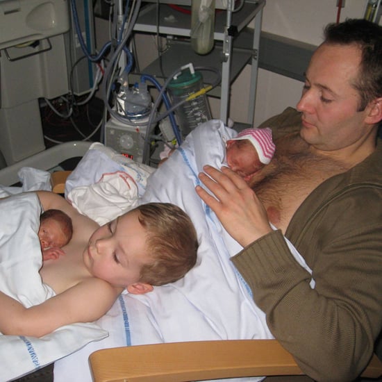 Father and Son Doing Skin-to-Skin Contact With Twins