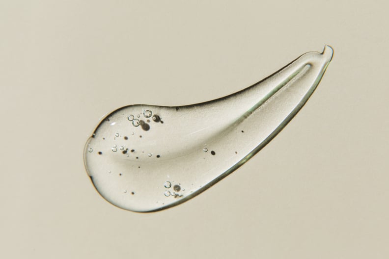 transparent smear of gel on beige background