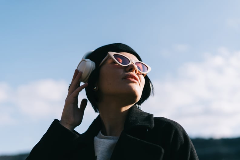 woman listening to 8D audio music from brain flossing trend on tiktok