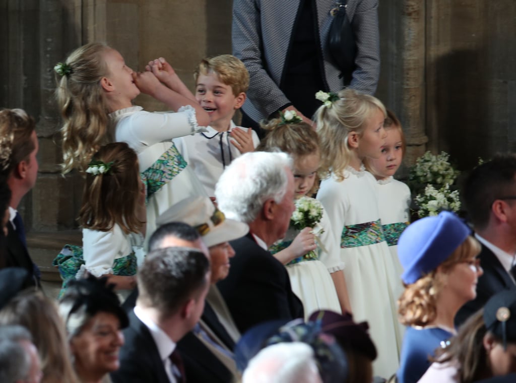 Inside St. George's Chapel, George chuckles as Savannah Phillips, the Queen's great-granddaughter, adds air trumpet to the sounds of the ceremony.