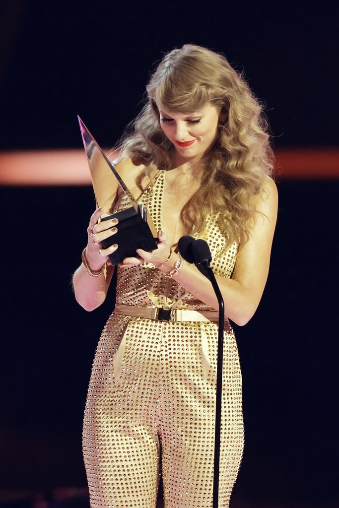Taylor Swift's Gold Jumpsuit by The Blonds at the AMAs