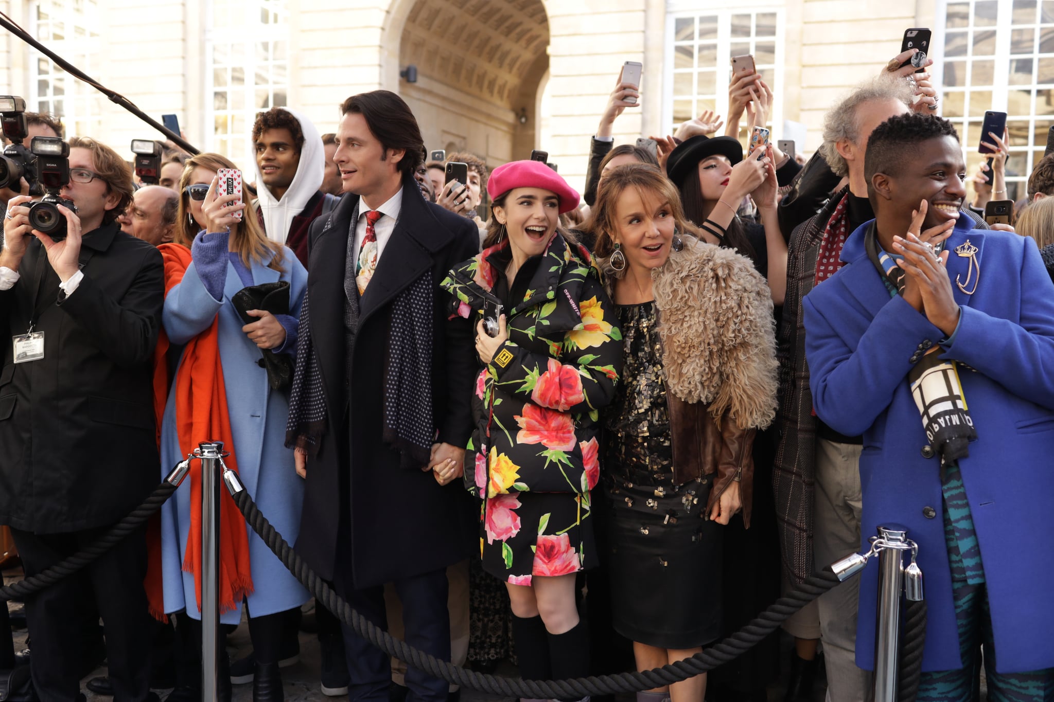 EMILY IN PARIS (L to R) WILLIAM ABADIE as ANTOINE, LILY COLLINS as EMILY, PHILIPPINE LEROY-BEAULIEU as SYLVIE and SAMUEL ARNOLD as LUKE in episode 110 of EMILY IN PARIS. Cr. CAROLE BETHUEL/NETFLIX  2020