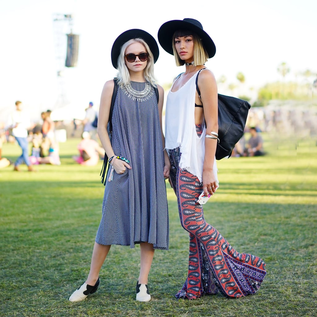 Fedoras top off all types of outfits at Coachella, whether it be a breezy shift dress or paisley-print wide-leg pants.