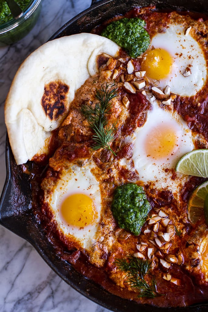 Indian-Style Baked Eggs With Green Harissa and Naan