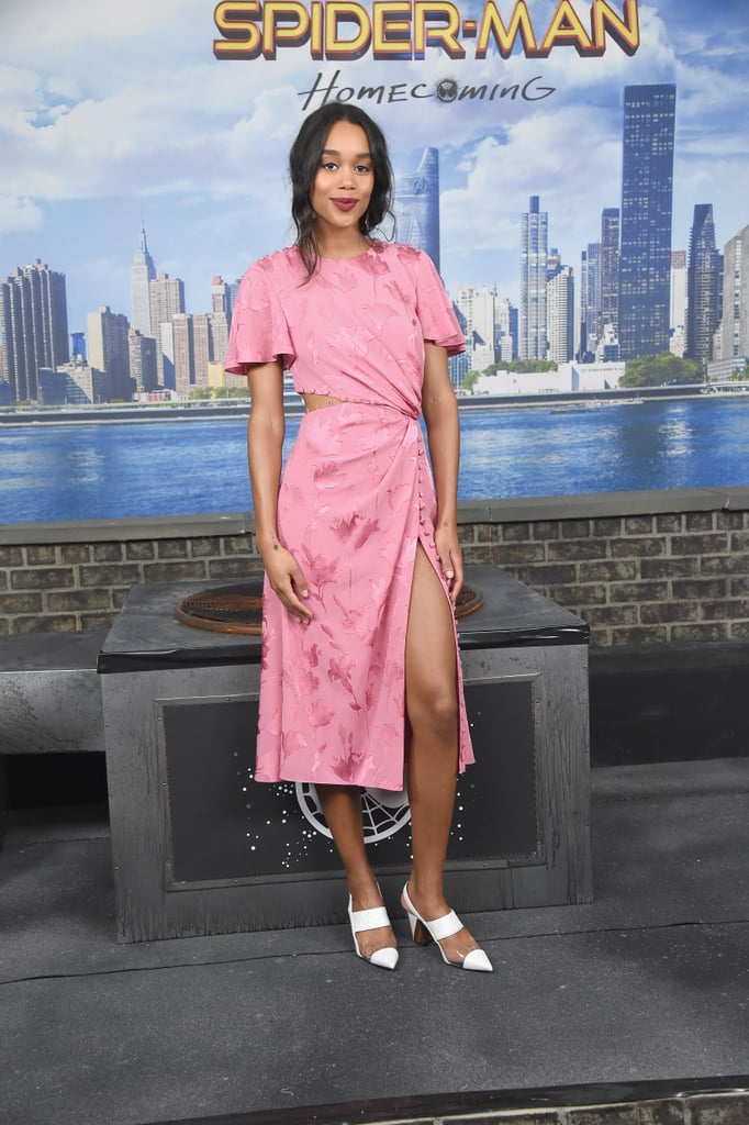 Wearing a pink silk Prabal Gurung dress that features a side cutout.