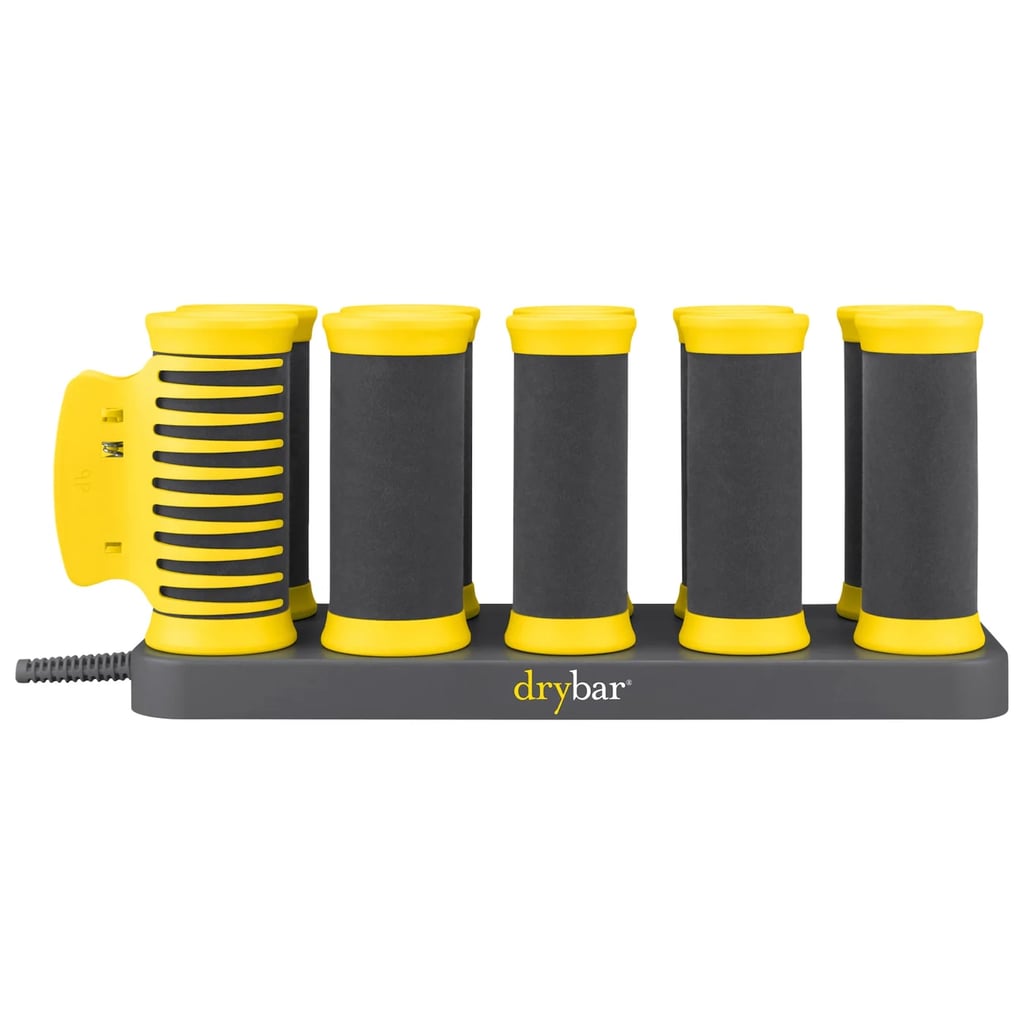 Dry Bar The Roller Club Curling Hot Hair Rollers ($129)
These hot rollers are longer rather than wider, so they're perfect for anyone who has long hair and needs to be able to wrap it around a roller multiple times.

Pros: Designed specifically for long hair, delivers smooth, voluminous curls, gentle on hair with minimal frizz
Cons: Higher price point, limited to six rollers so may not cover very thick hair in one go
Material: Ceramic infused rollers with velvet finish
Dimensions: Rollers are approximately 1.25 inches in diameter and longer than standard rollers
Color: Signature Drybar yellow with gray accents
Who it's best for: People with long or layered hair looking for nice curls
Extras: Includes six rollers, six creaseless clips, and a travel-ready storage case

What Reviewers Say: "I loved the rollers! They are so cute and my hair came out gorgeous! I used them for my formal and love how my hair held! I would definitely recommend buying and using them for a special event."
