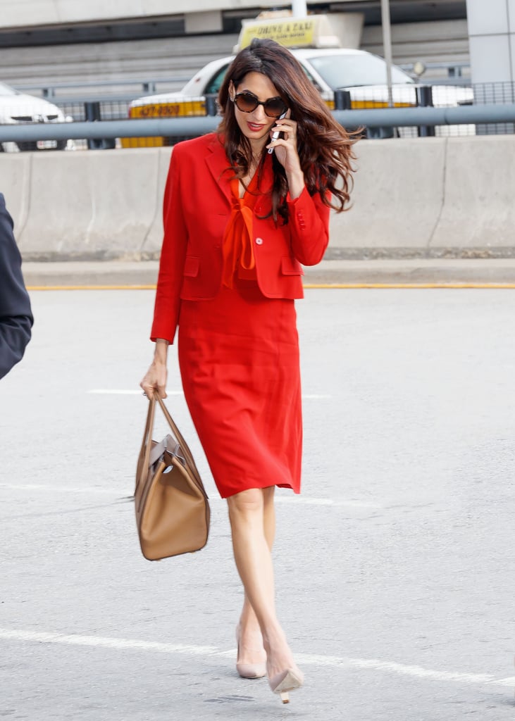 In 2017, Amal looked like the ultimate power woman in a red suit. She wore Salvatore Ferragamo pumps and carried a Dolce & Gabbana tote.