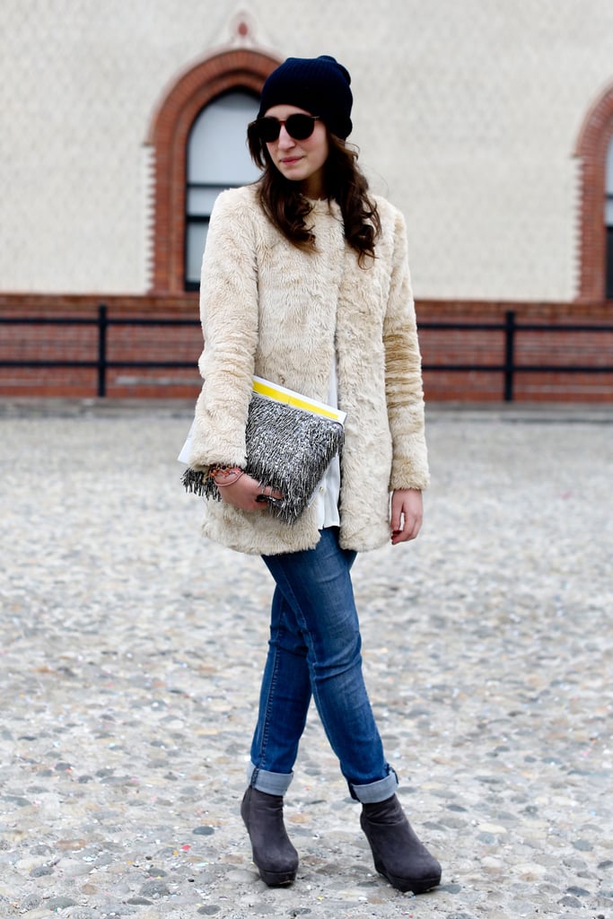 The furry texture gave this minimalist coat luxe appeal ...