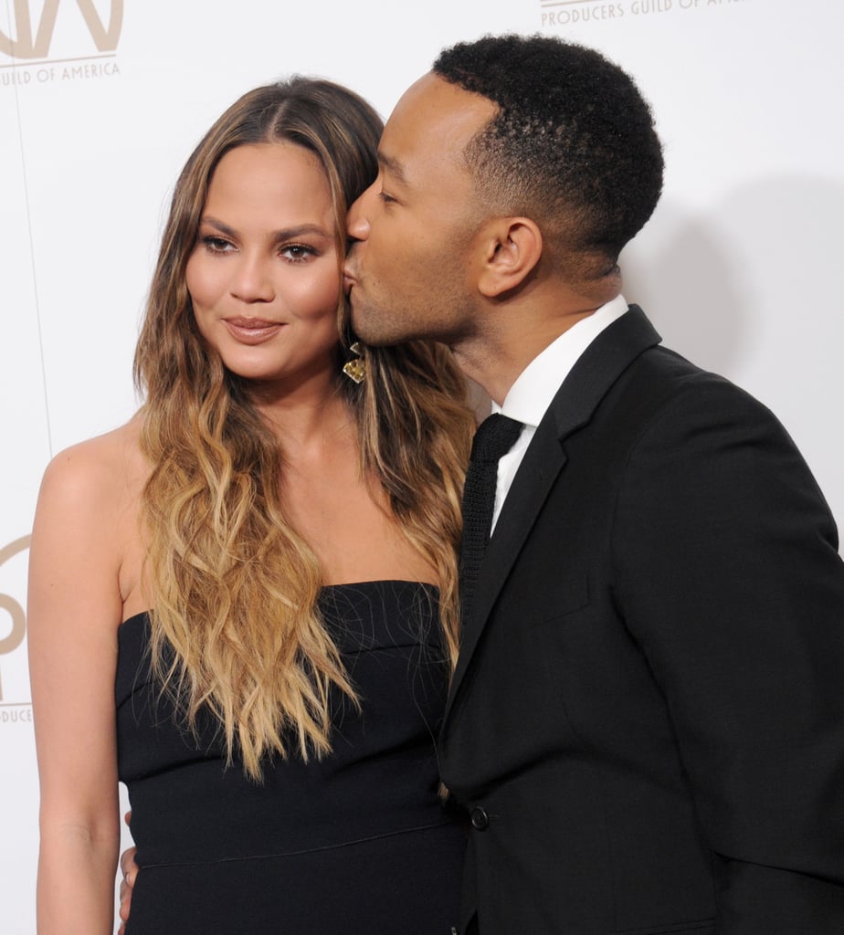January: John Gave Chrissy a Sweet Smooch at the Producers Guild Awards