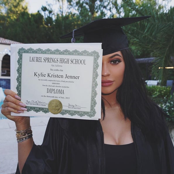 Kylie Jenner reminding us just how young and successful she is after her high school graduation.