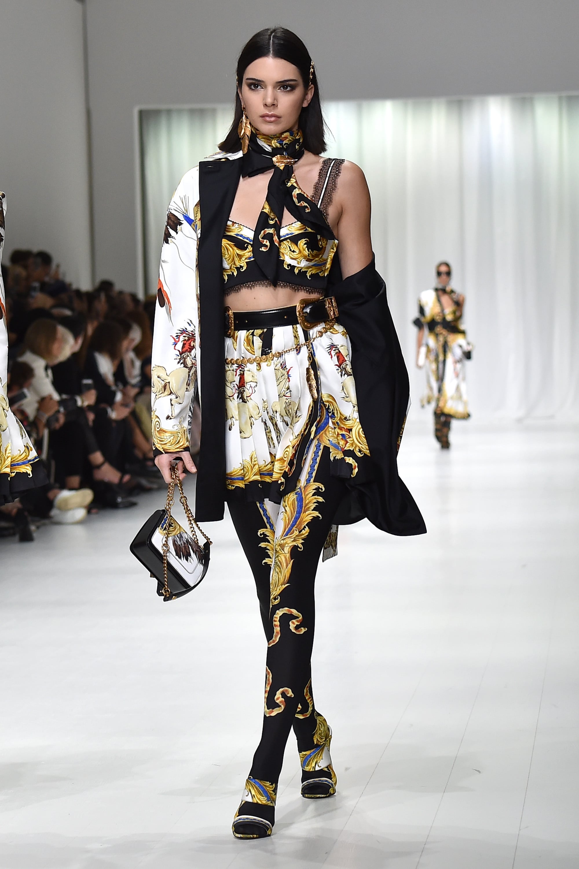 Kendall Jenner walks the runway at the Versace Ready to Wear fashion