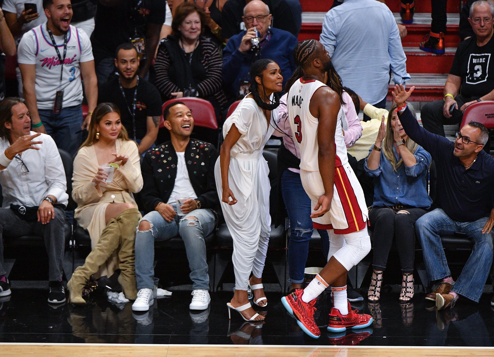 Celebrity Entertainment Chrissy Teigen And John Legend Really Took The Heat At Dwyane Wade S Last Home Game Popsugar Celebrity Photo 4