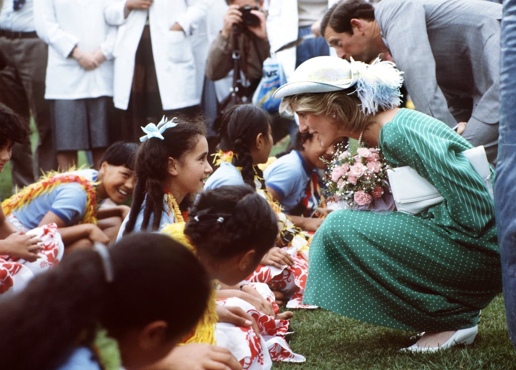 Princess Diana, along with Prince Charles, met with a group of children in New Zealand for an official welcoming ceremony in April 1983.