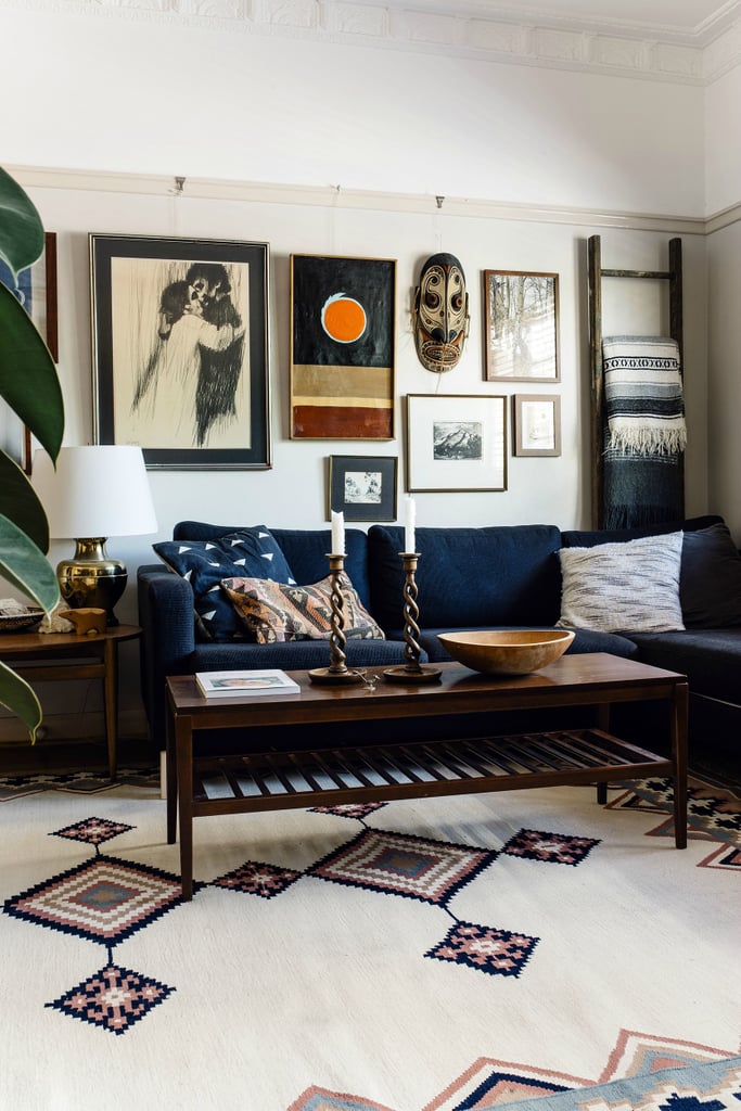 It's impossible not to appreciate the eclectic mix of art on this living room gallery wall!