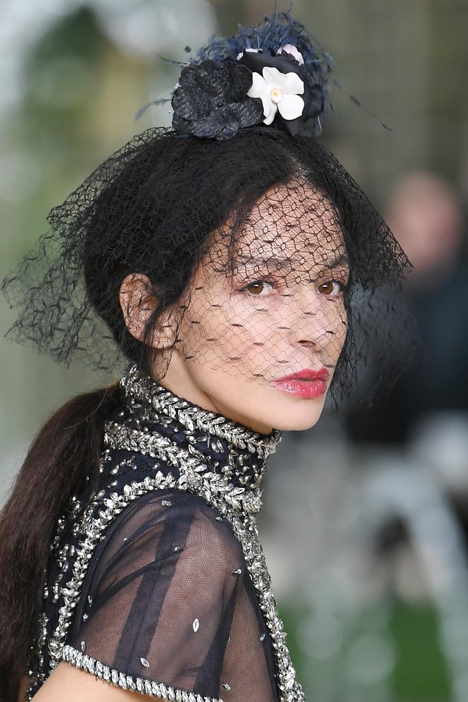 Models Wore Black Netted Veils With Floral Fixtures